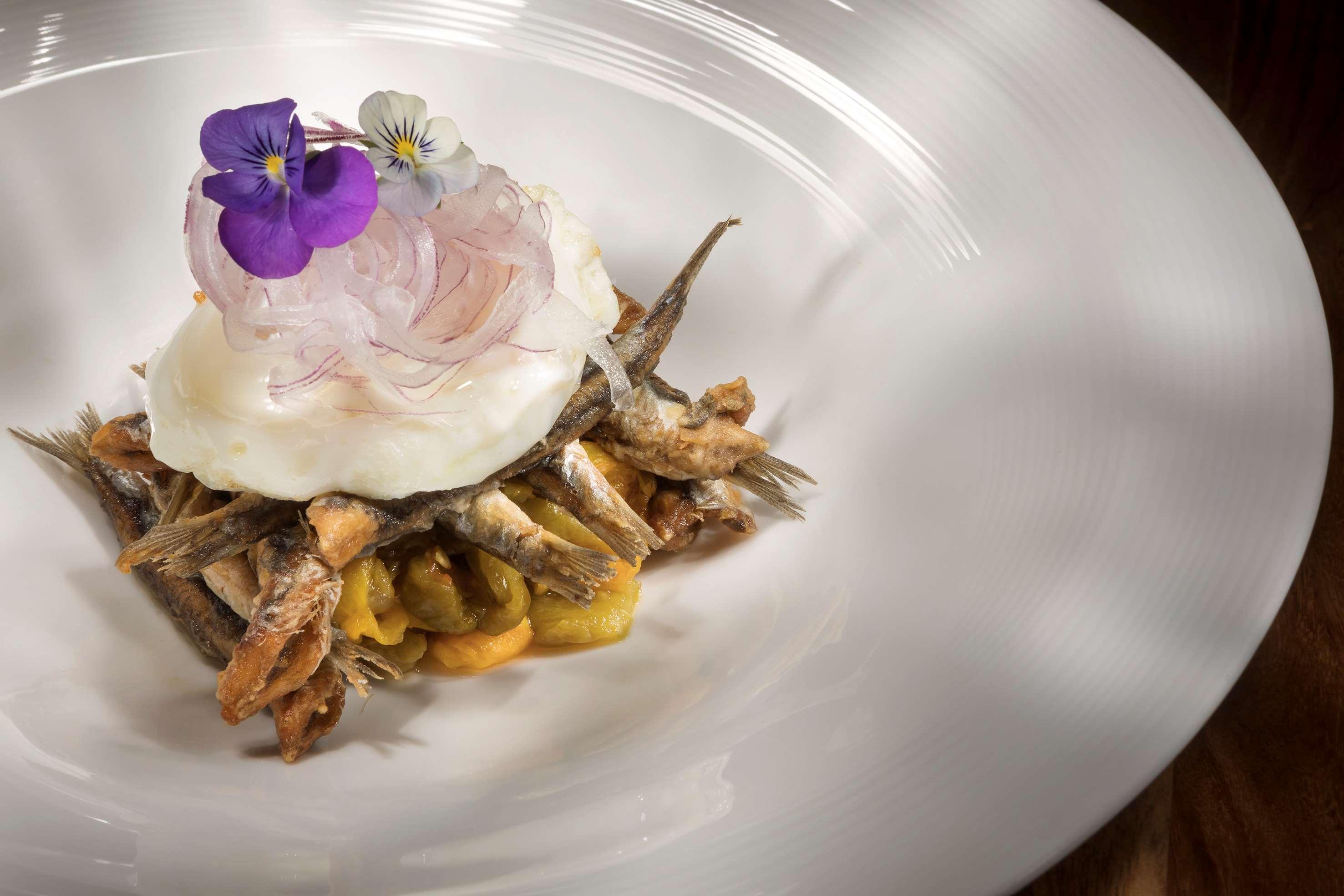 Hotel Me Marbella By Melia Esterno foto A dish of anchovies